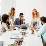 Multiracial business people working in office