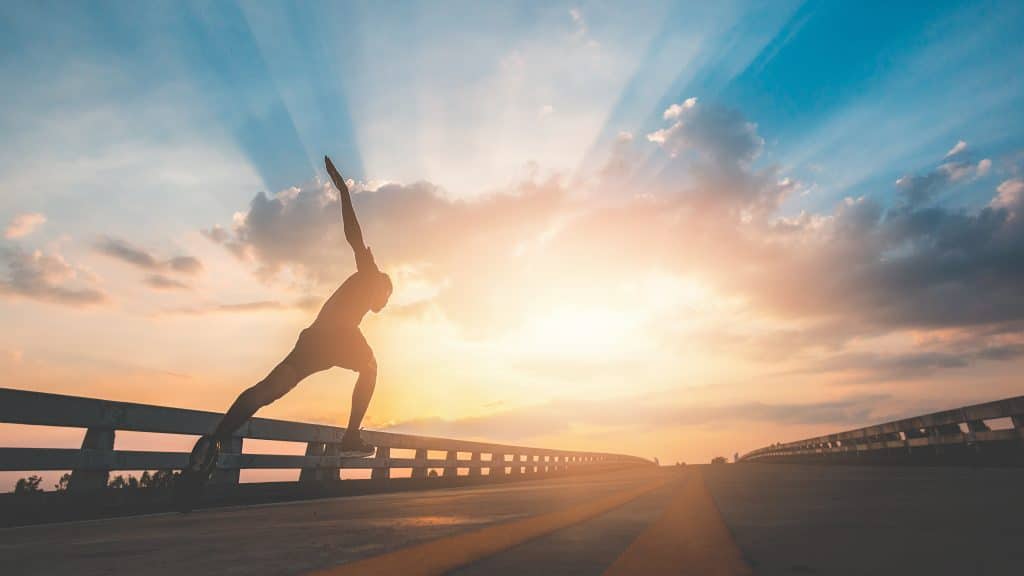 Athlete runner feet running on road