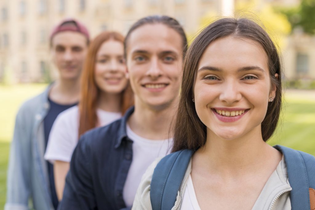 group students happy be back university